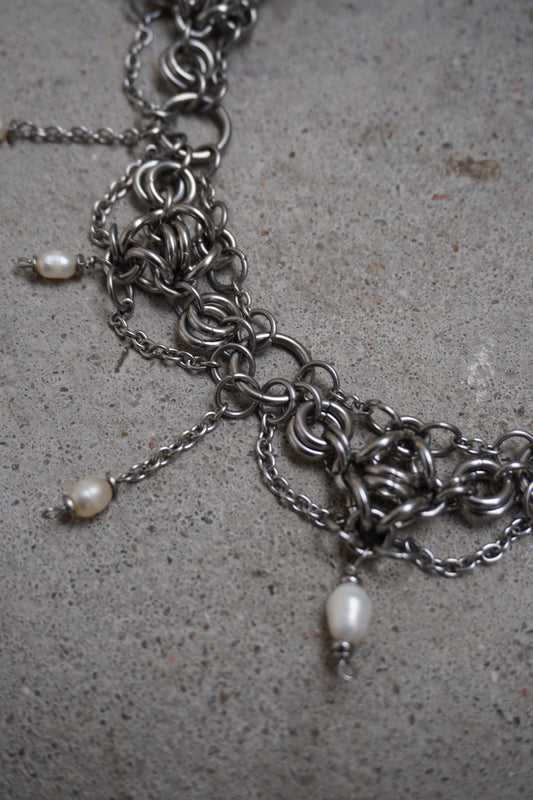 rings and pearls necklace