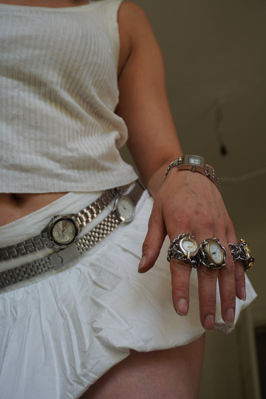 the silver watch belt
