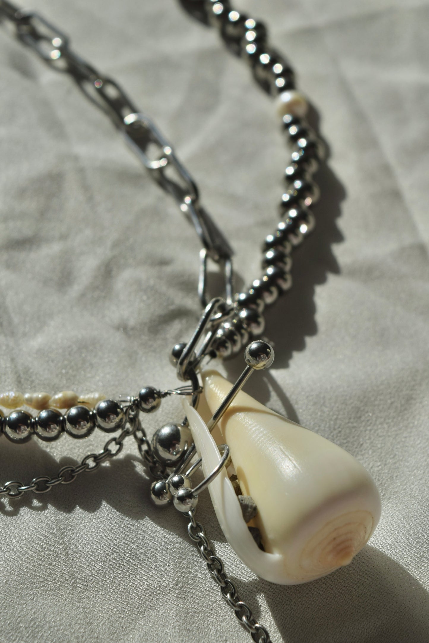 pierced seashell necklace