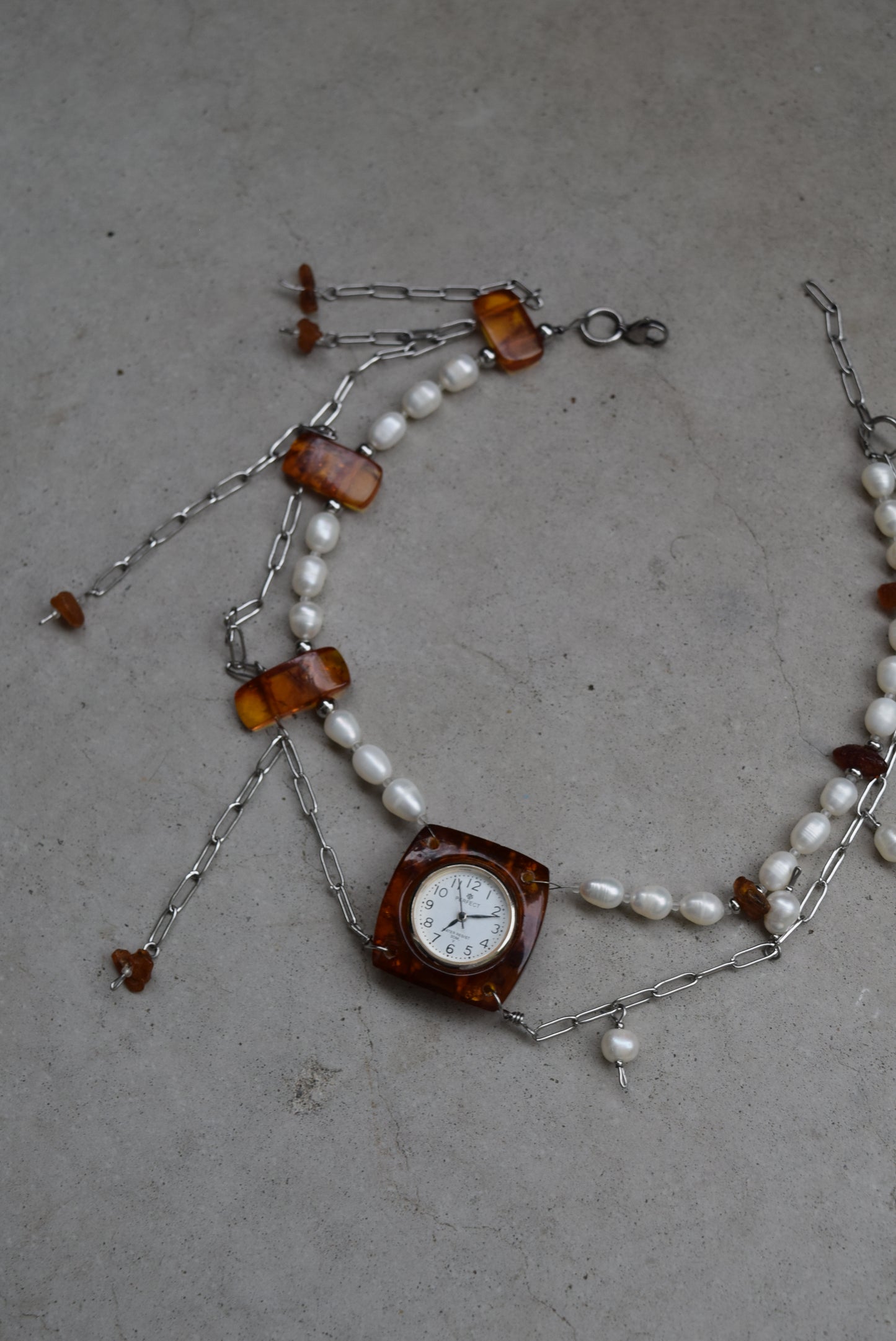 upcycled amber watch and sweetwater pearls necklace